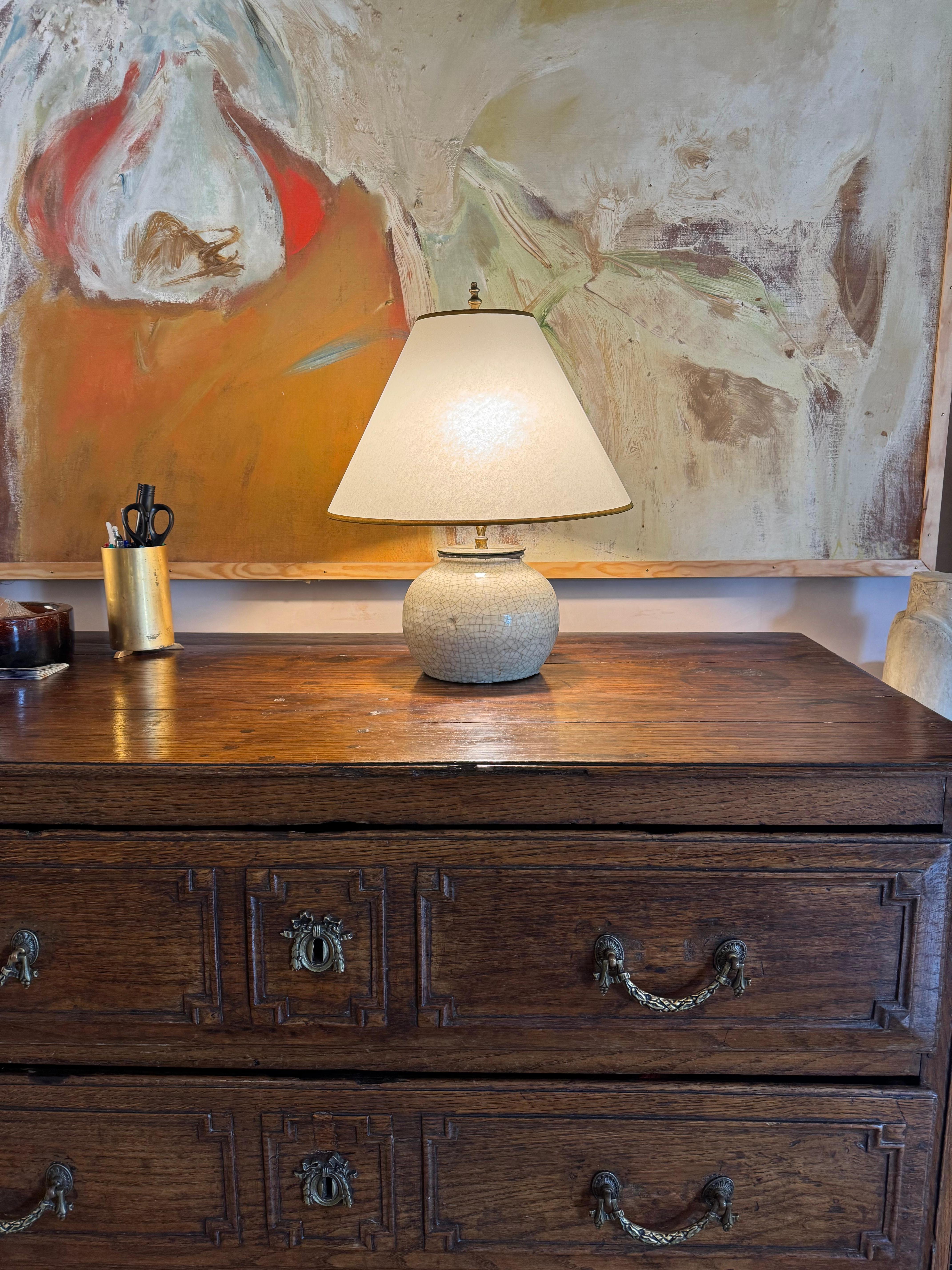 A beautiful French crackle glazed and patinated brass table lamp with bespoke top fitting shade. Rewired and Pat tested.