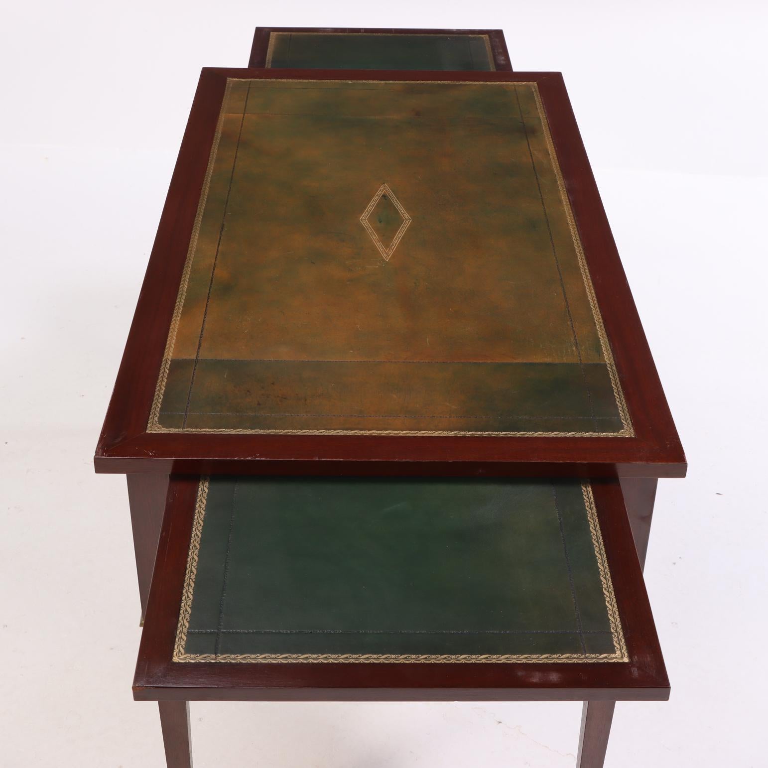 A French Directoire style Leather Top Mahogany Writing Desk, C. 1950. In Good Condition For Sale In Philadelphia, PA