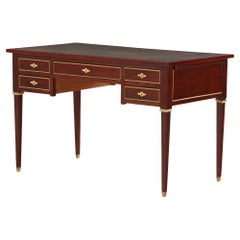 A French Directoire style Leather Top Mahogany Writing Desk, C. 1950.