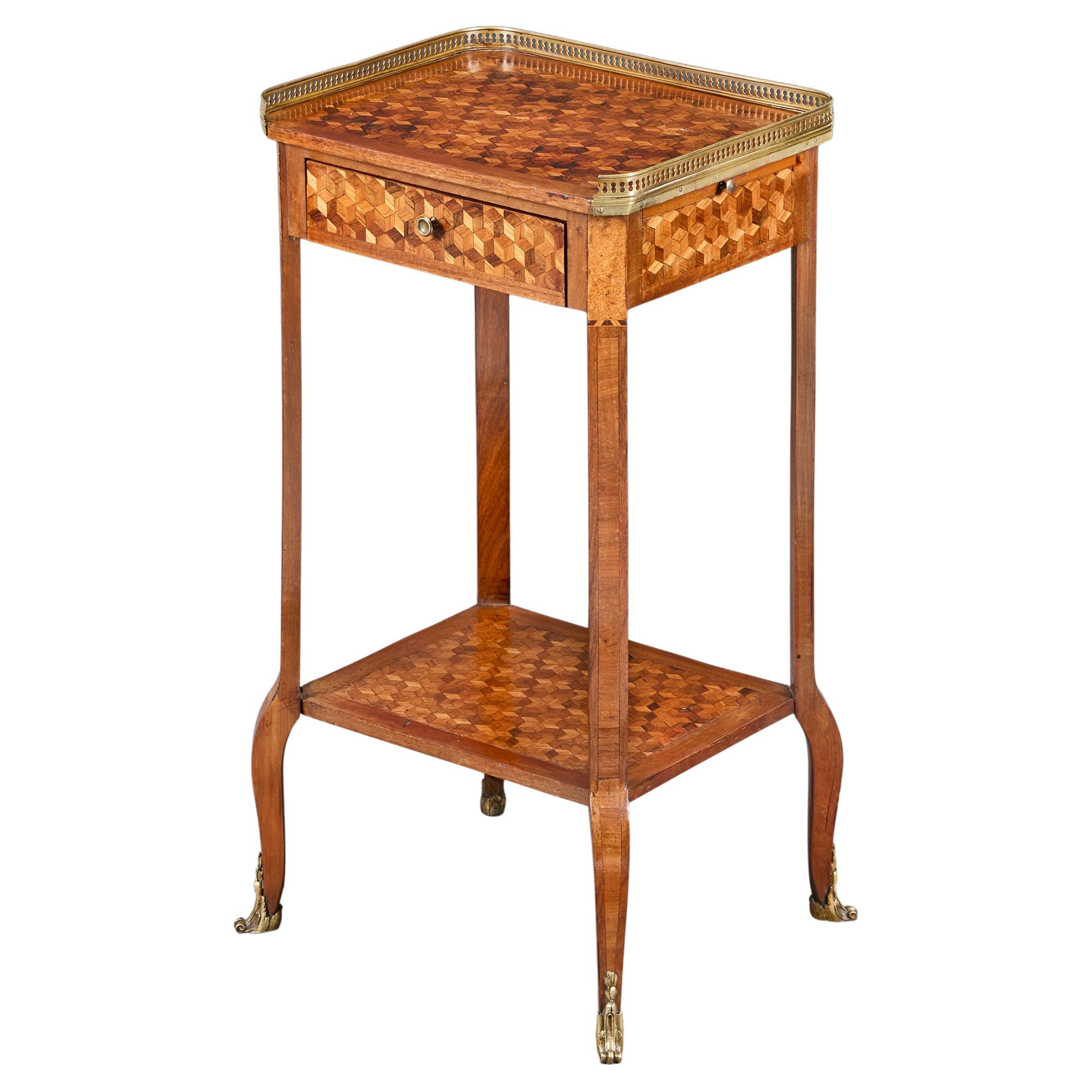 A French Early 19th Century Parquetry Table For Sale