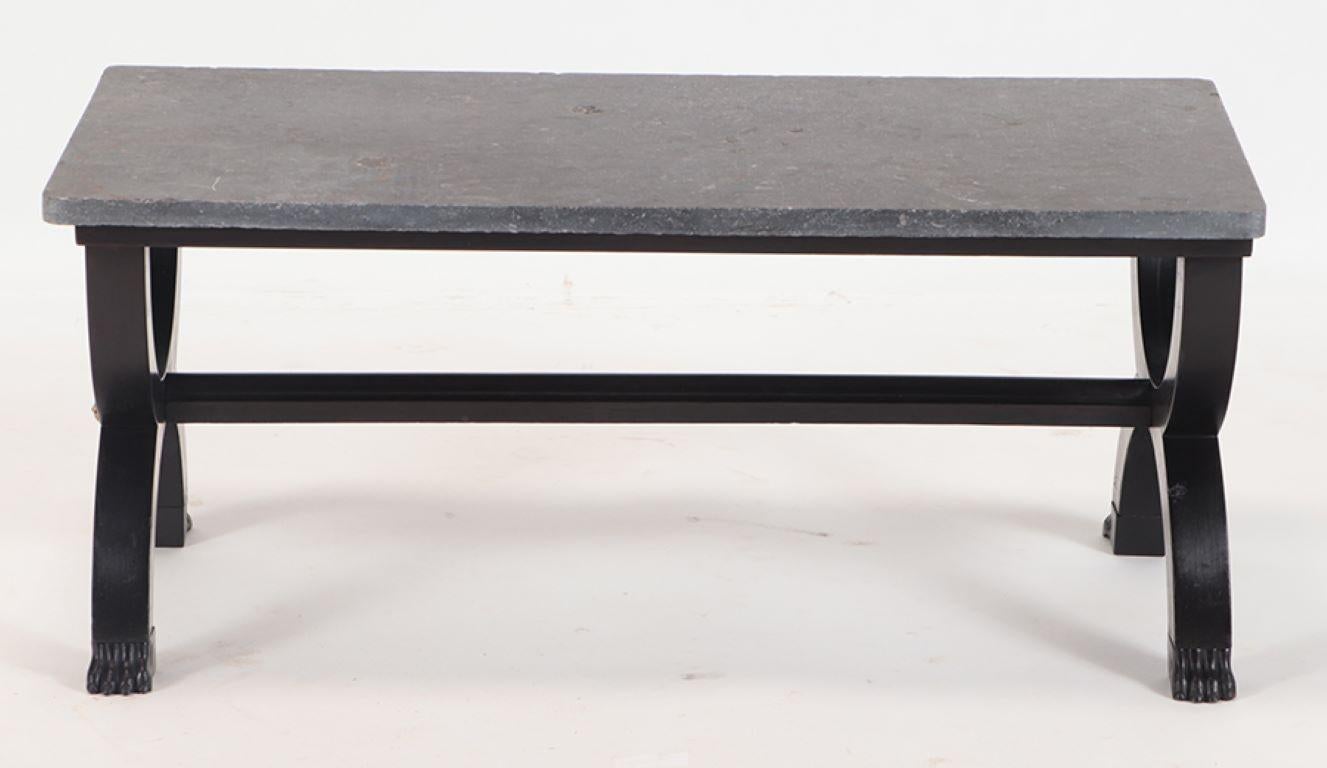A French ebonized Empire style marble top coffee table with bronze mounts circa 1940. 