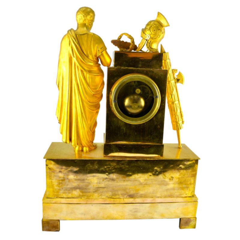 Gilt French Empire Allegorical Clock Depicting Roman Triumph and Power For Sale
