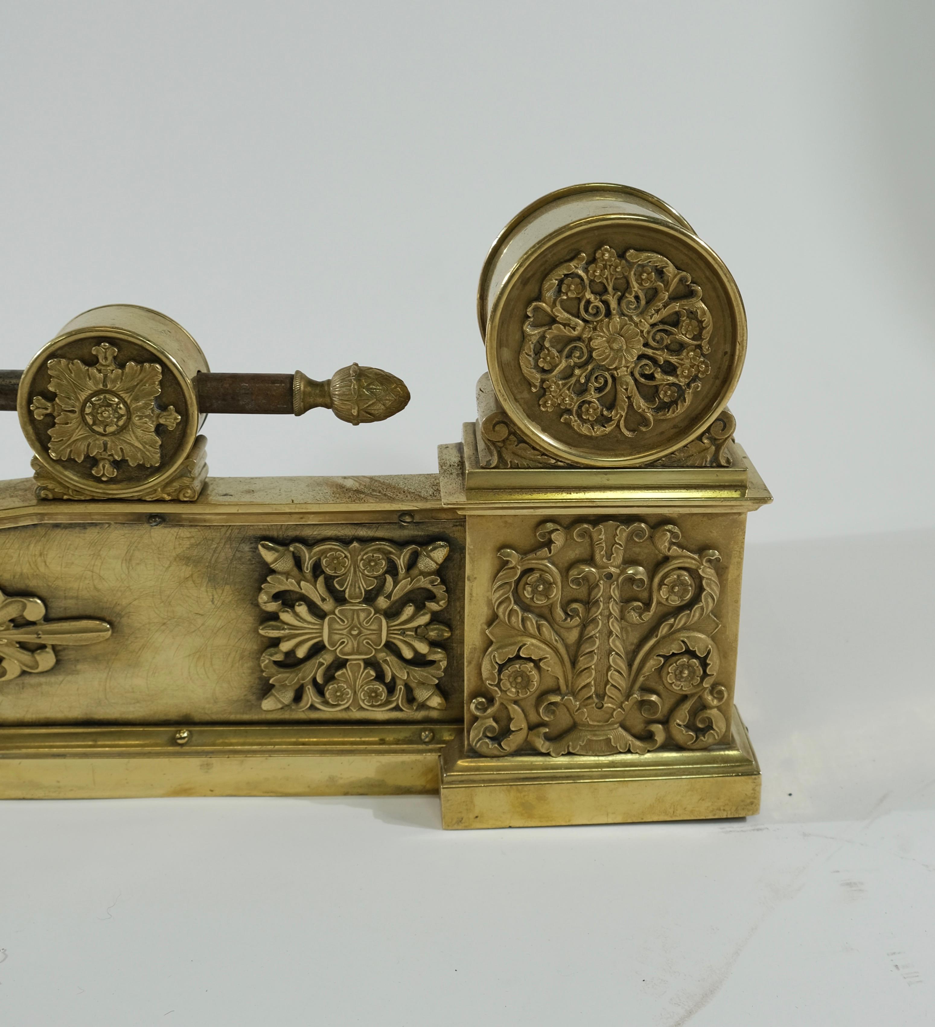 A French decorative stand to place in a fireplace, gilt, brass and bronze. 
This item will make any fireplace look great.