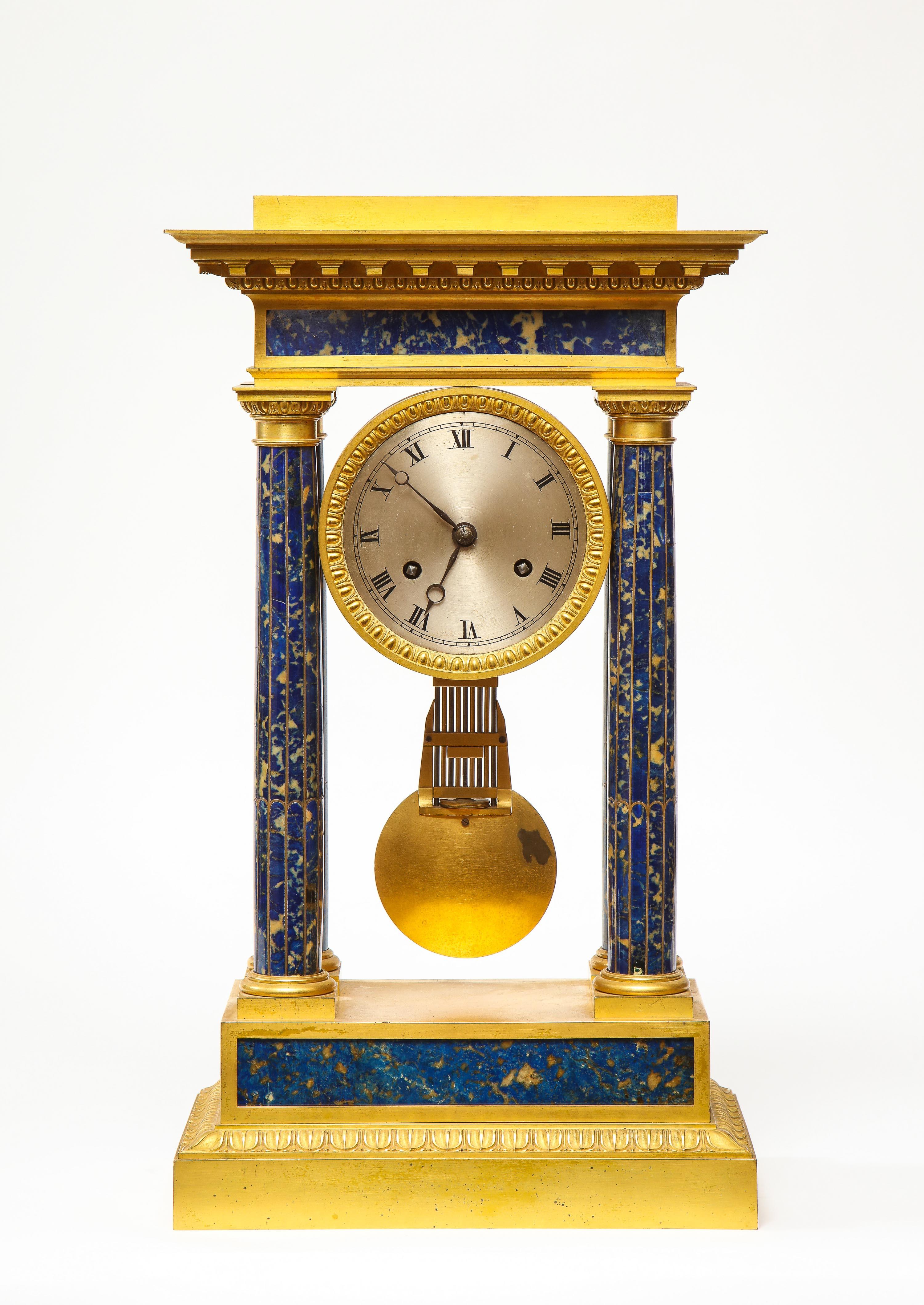 A French Empire ormolu bronze and Lapis Lazuli mantle clock, circa 1860.

Very fine quality, presents very well. Lapis lazuli in good condition. 

Measures: 17