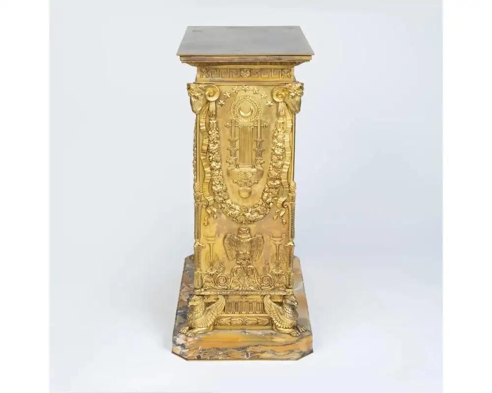 A French Empire Ormolu Bronze Mantle Clock after Percier et Fontaine, 19th Century.

In the hallowed halls of horological history, this Empire gilt-bronze ormolu mantle clock, a sublime masterpiece from late 19th-century Paris, emerges as a beacon