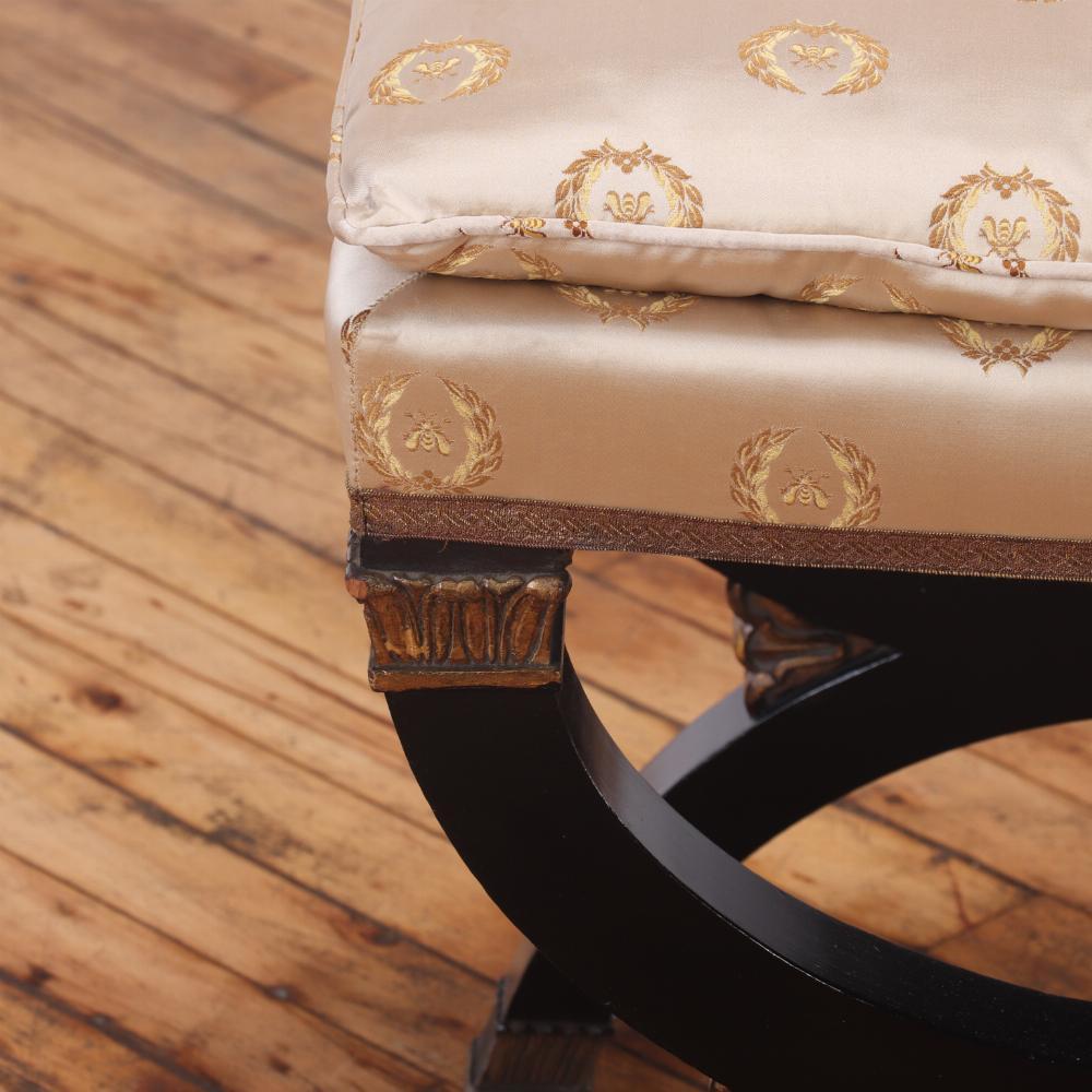 Ebonized A French Empire style ebonized and giltwood stool, C. 1940. For Sale