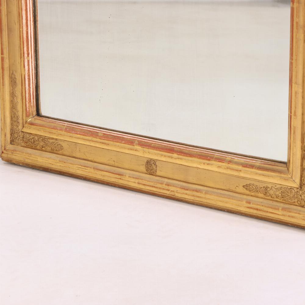 A French Empire style giltwood and gesso mirror, C. 1880. In Good Condition For Sale In Philadelphia, PA