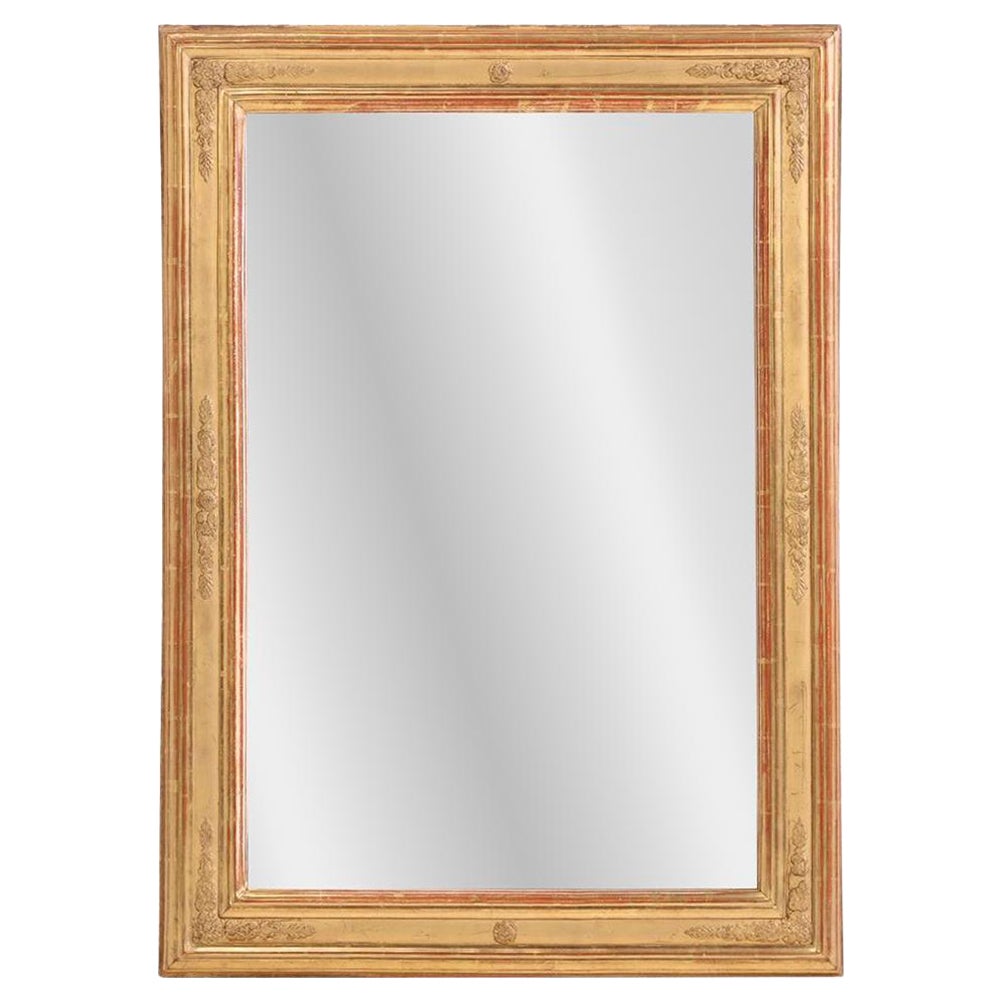 A French Empire style giltwood and gesso mirror, C. 1880. For Sale