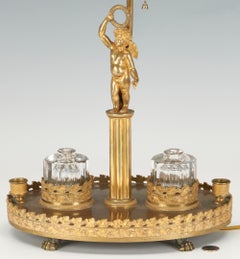 A French Figural Bronze Inkwell Desk Lamp with Tole Shade