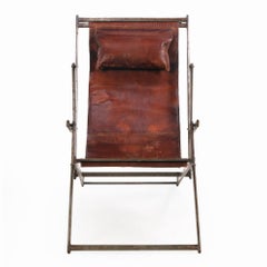 A French Folding Iron and Leather Lounge Chair, C. 1970.