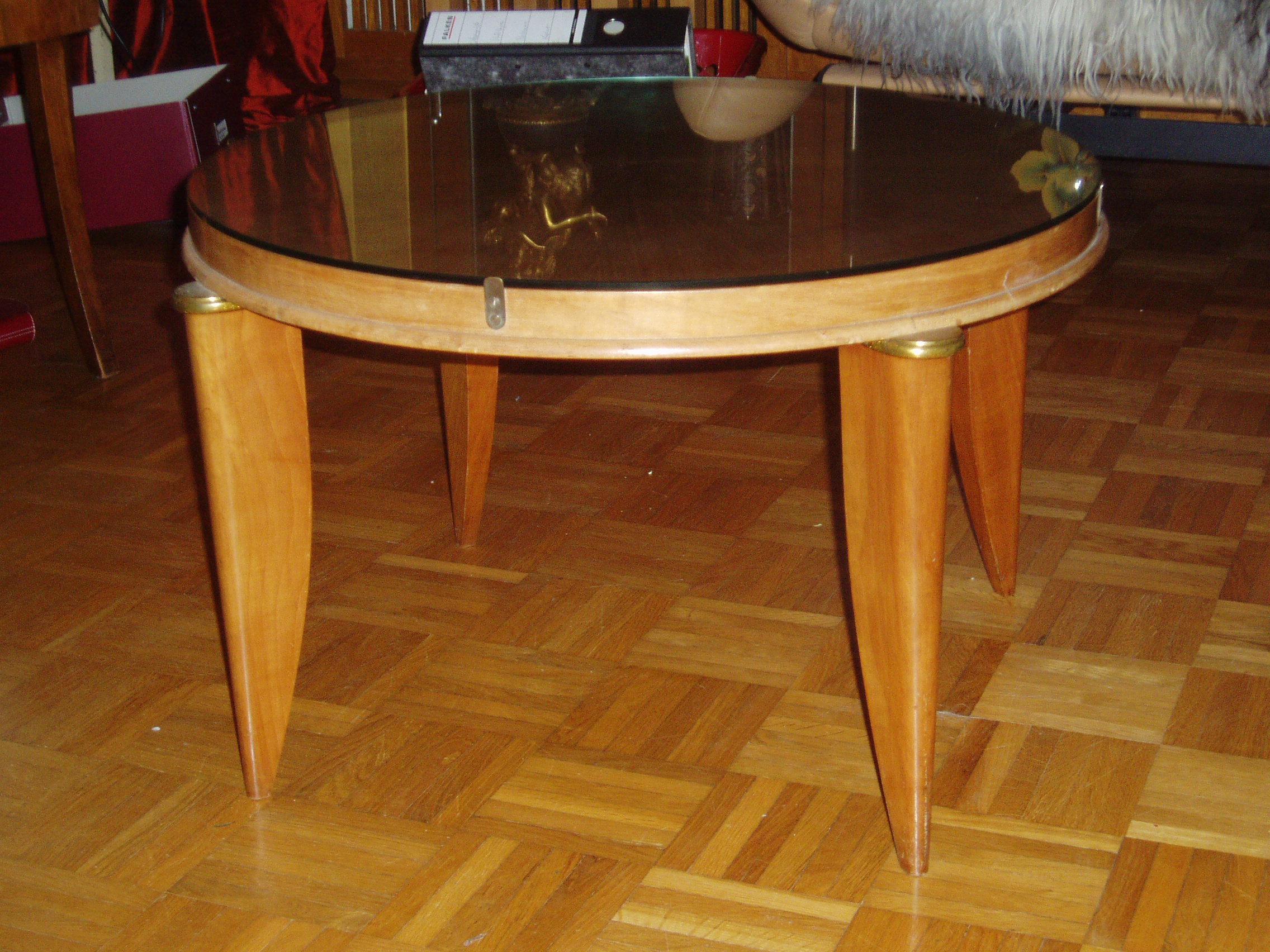 Elegant french Art Deco side table / coffee table by Maurice Jallot ( 1900 to 1971 )  of the late Art Deco era. Circa 1940. The table is well documented. Very solid construction. Sycamore maple with brass finishes. With overlying glass top, fixed
