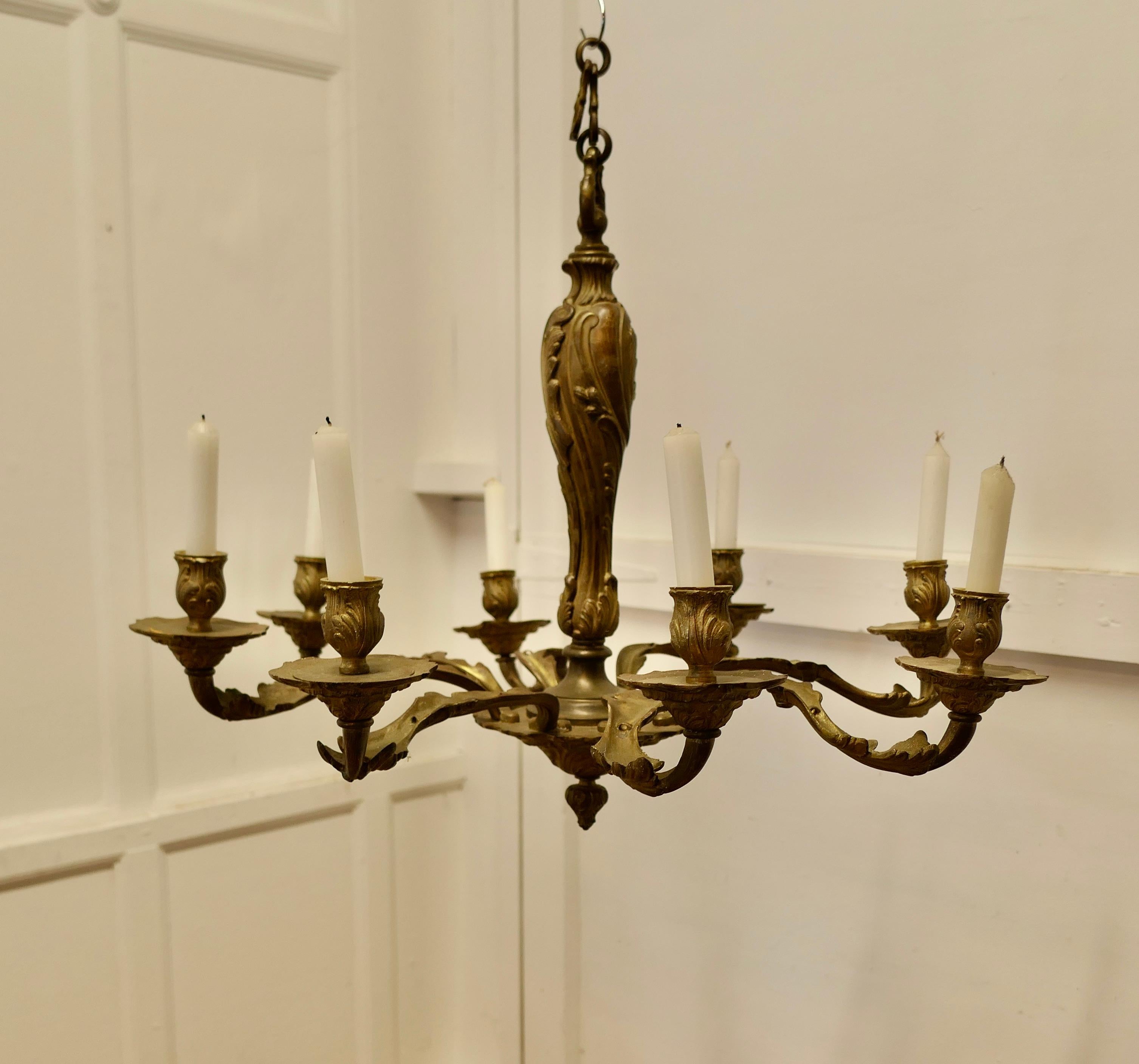 A French Gilded Brass 8 Branch Rococo Chandelier (Candelier)

This is an excellent quality and large piece it is very heavy and has a superb aged gilt finish
The Chandelier is decorated in the Rococo way with entwined Acanthus leaves 
So now with