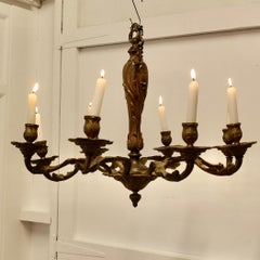A French Gilded Brass 8 Branch Rococo Chandelier (Candelier)