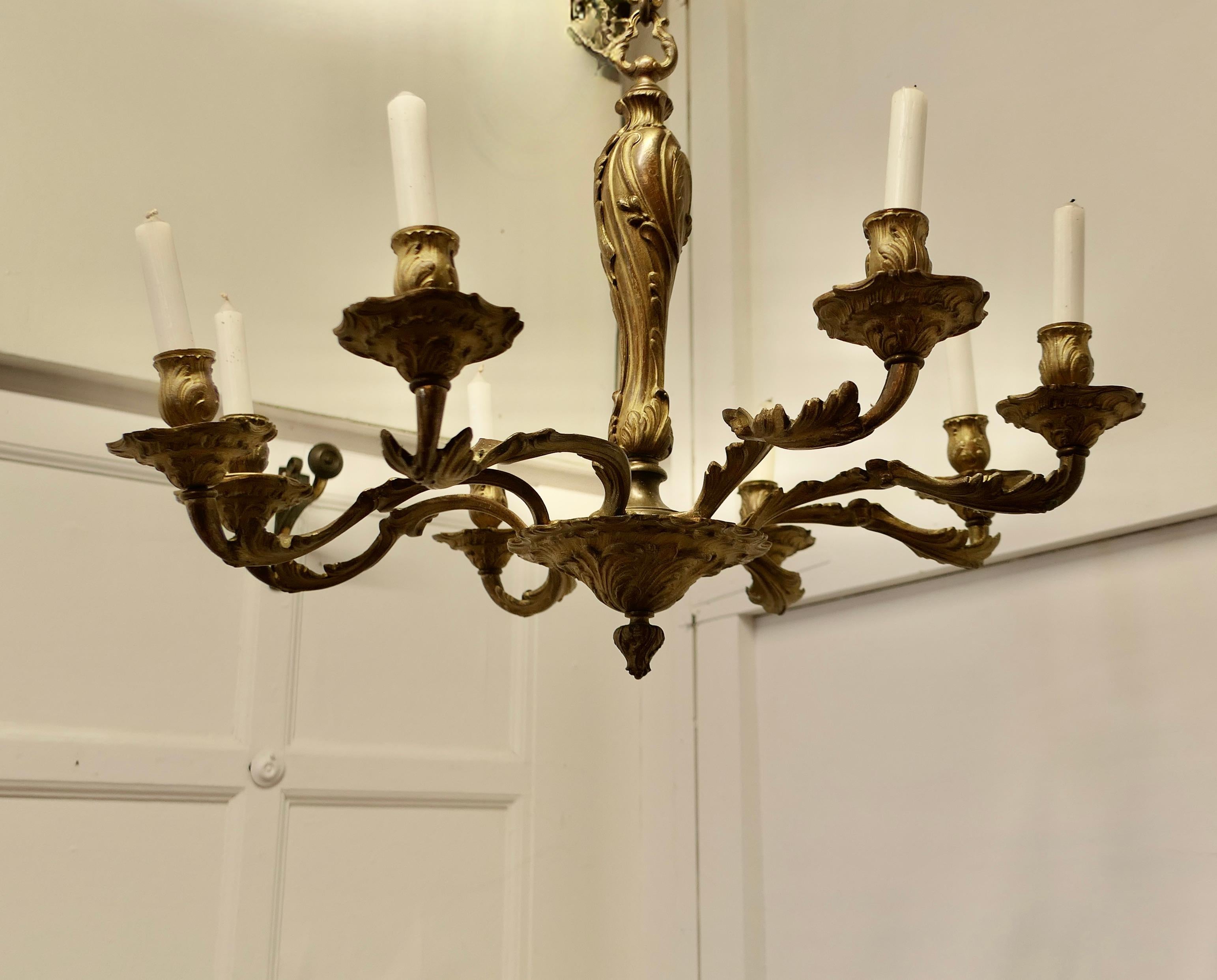 19th Century A French Gilded Brass 8 Branch Rococo Chandelier (Candelier)   For Sale
