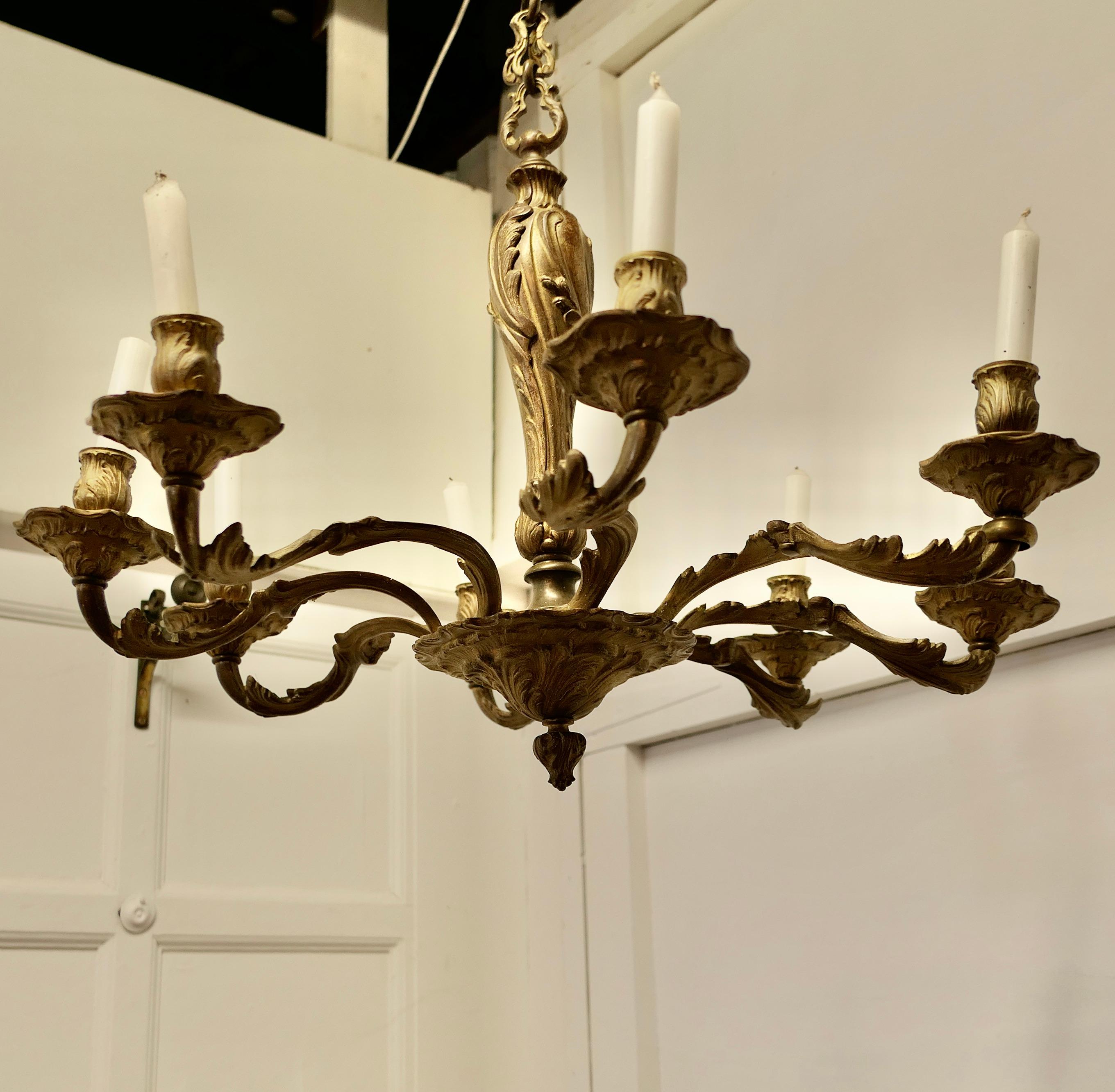 A French Gilded Brass 8 Branch Rococo Chandelier (Candelier)   For Sale 1