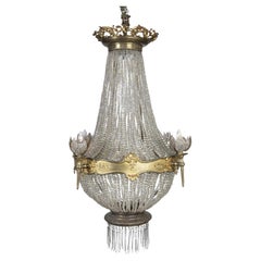 Ein französischer Kronleuchter aus vergoldeter Bronze und Glas, 19.
