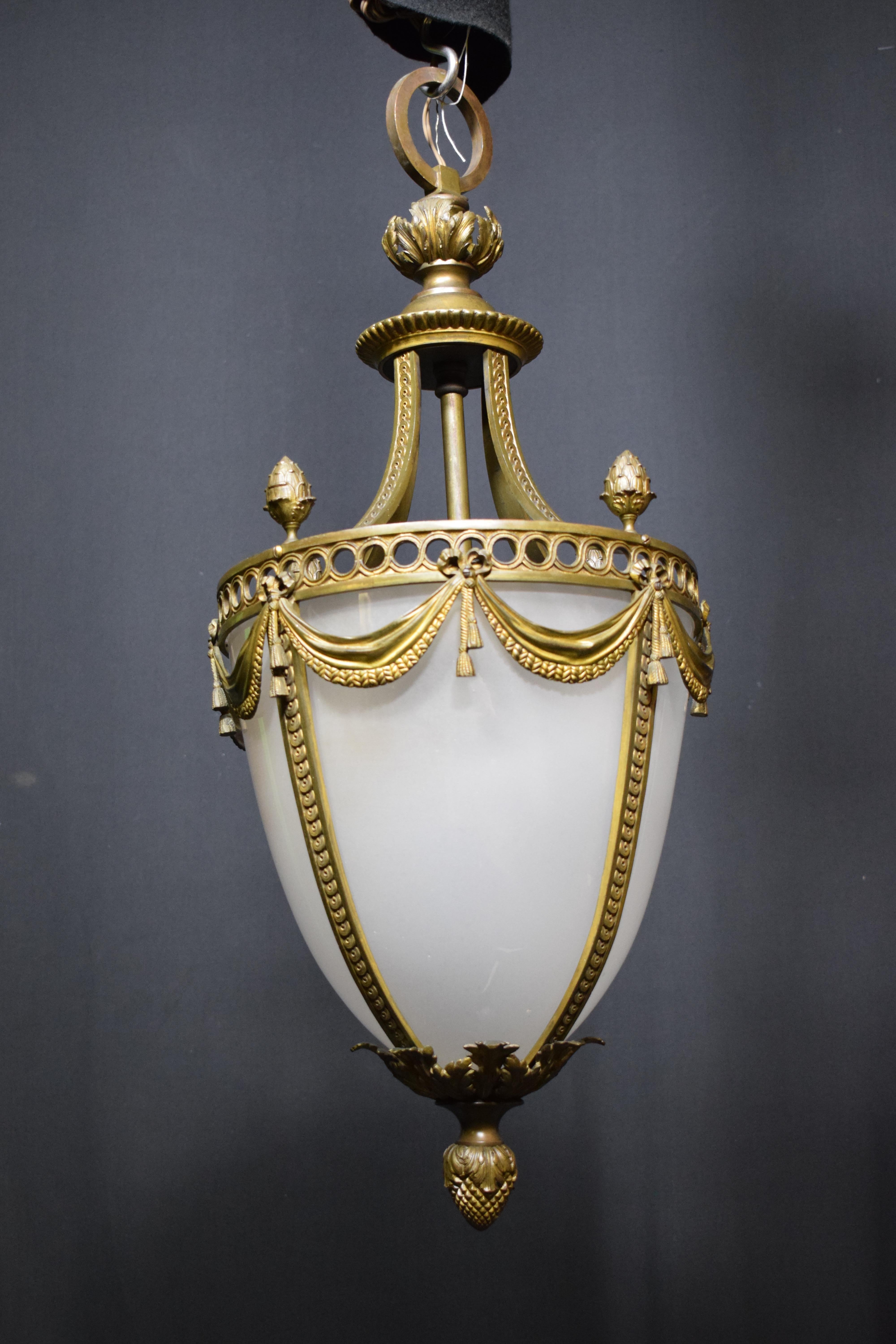 A very fine and decorative French Gilt Bronze Louis XVI style Hall Lantern. Fine Quality. Single Glass Globe (no panels). 4 Lights. France, circa 1920. 
CW5187.