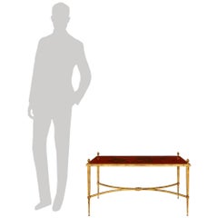 A French Gilt Iron and Japanese Lacquer coffee table, by Mai