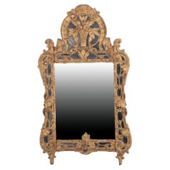 A.I.C., miroir français en bois doré.