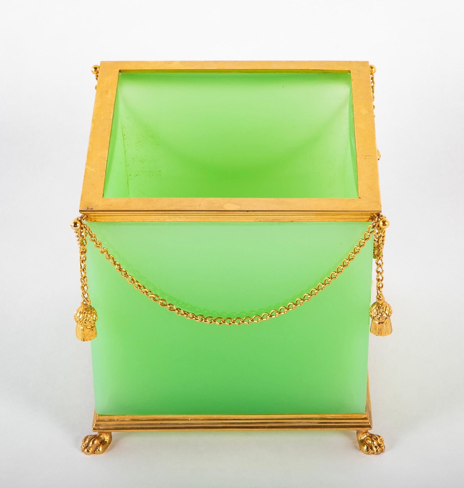 A French green opaline glass cachepot with gilt mounting.  20th century.  