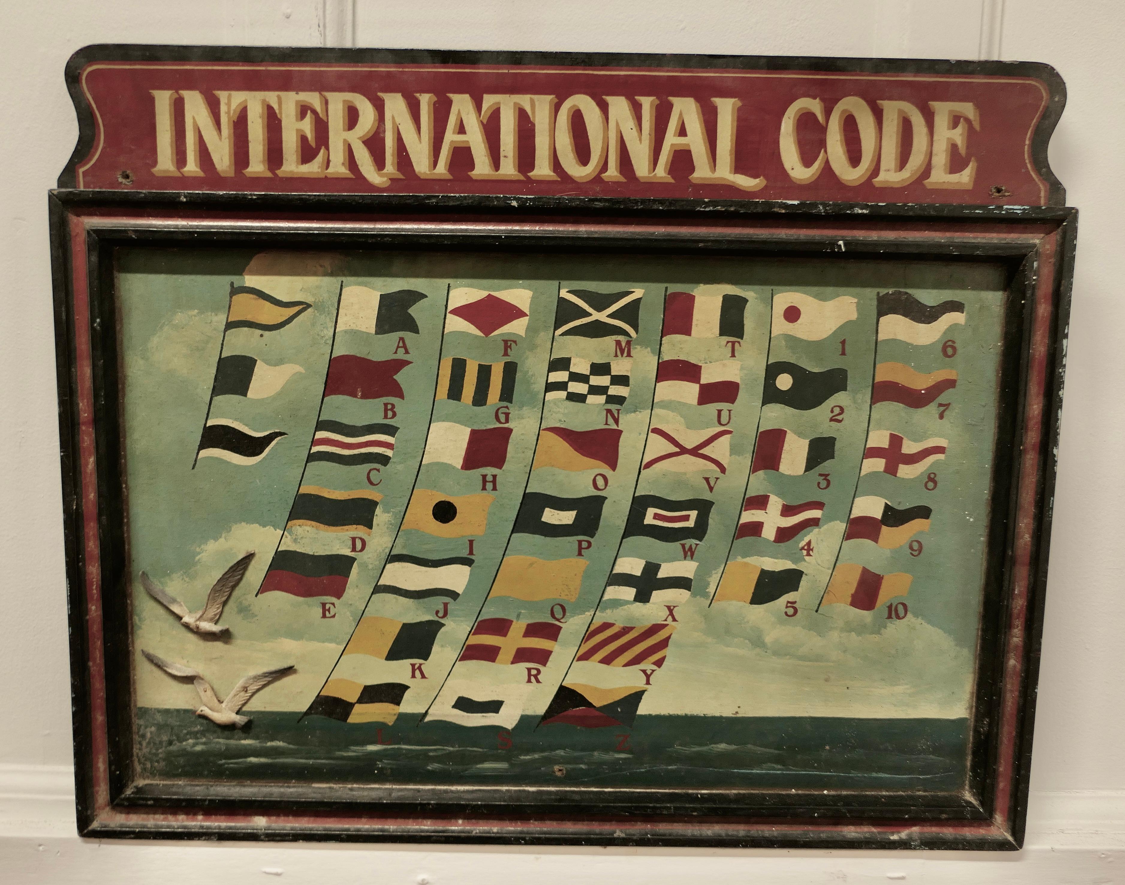A French Hand Painted International Code of Semaphore Signals   

This wonderful piece shows the signal flags for the alphabet and numbers
Beautifully done with a few seagulls and sea thrown in for good measure
The painting is on board with a