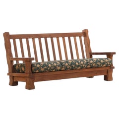 A French Heavy Oak Brutalist style Open Arm Sofa Frame, C. 1960.