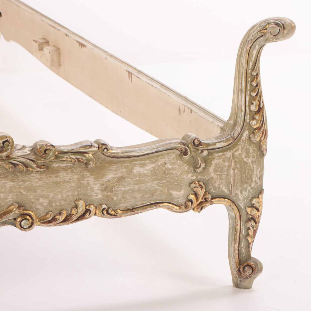 A French Hollywood Regency style painted and gilt carved full size bed, C. 1940. In Good Condition For Sale In Philadelphia, PA