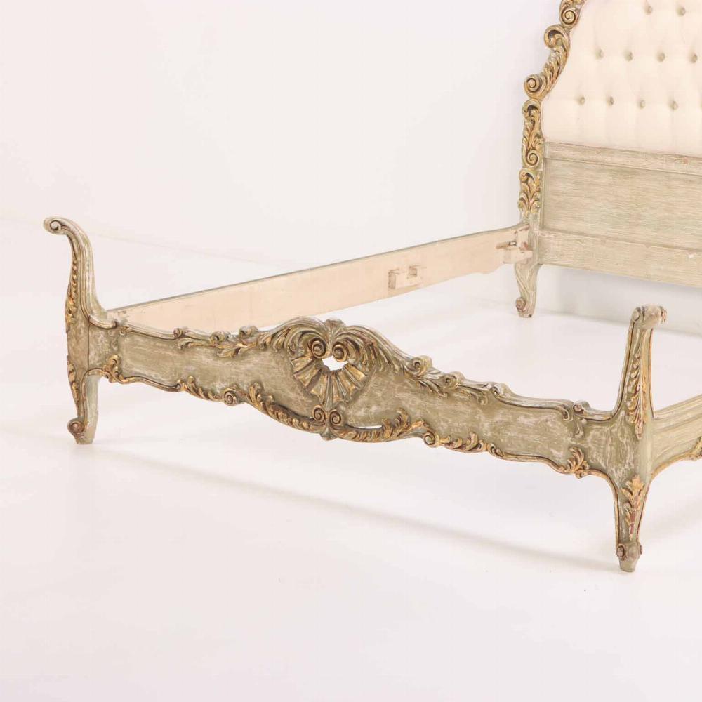 Mid-20th Century A French Hollywood Regency style painted and gilt carved full size bed, C. 1940. For Sale