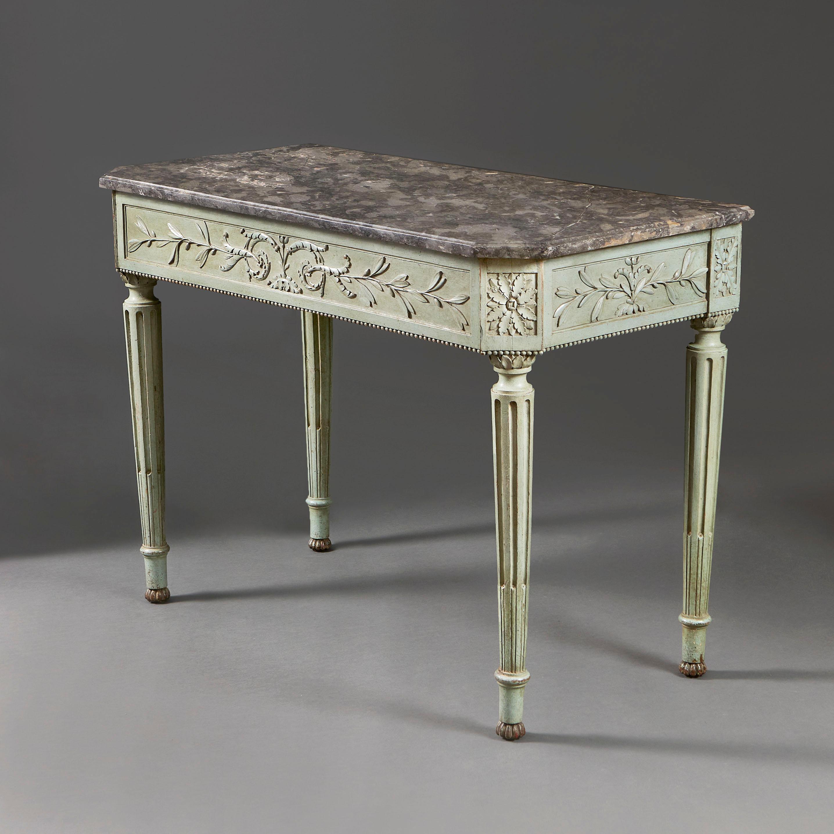 A fine late eighteenth century painted console table, the frieze decorated with olive branches, the central cartouche with acanthus and paterae on the canted corners, retaining the original grey veined marble top, supported on fluted tapering legs.