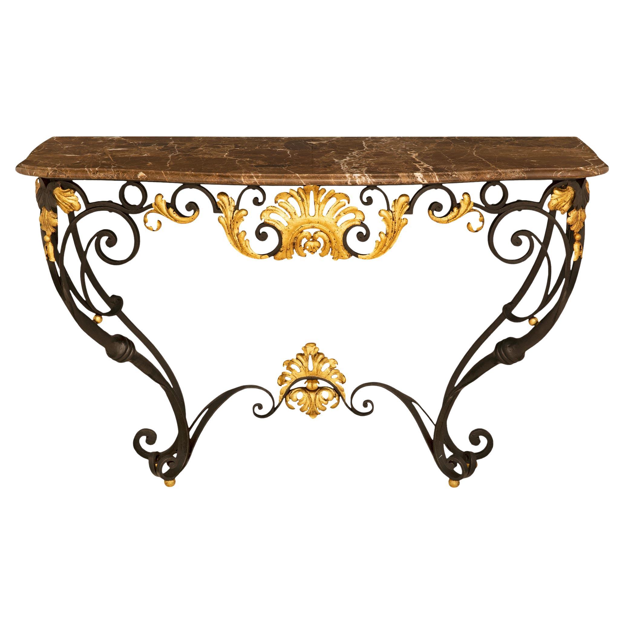 A French late 19th cent Louis XV st. wrought iron, gilt metal and marble console For Sale