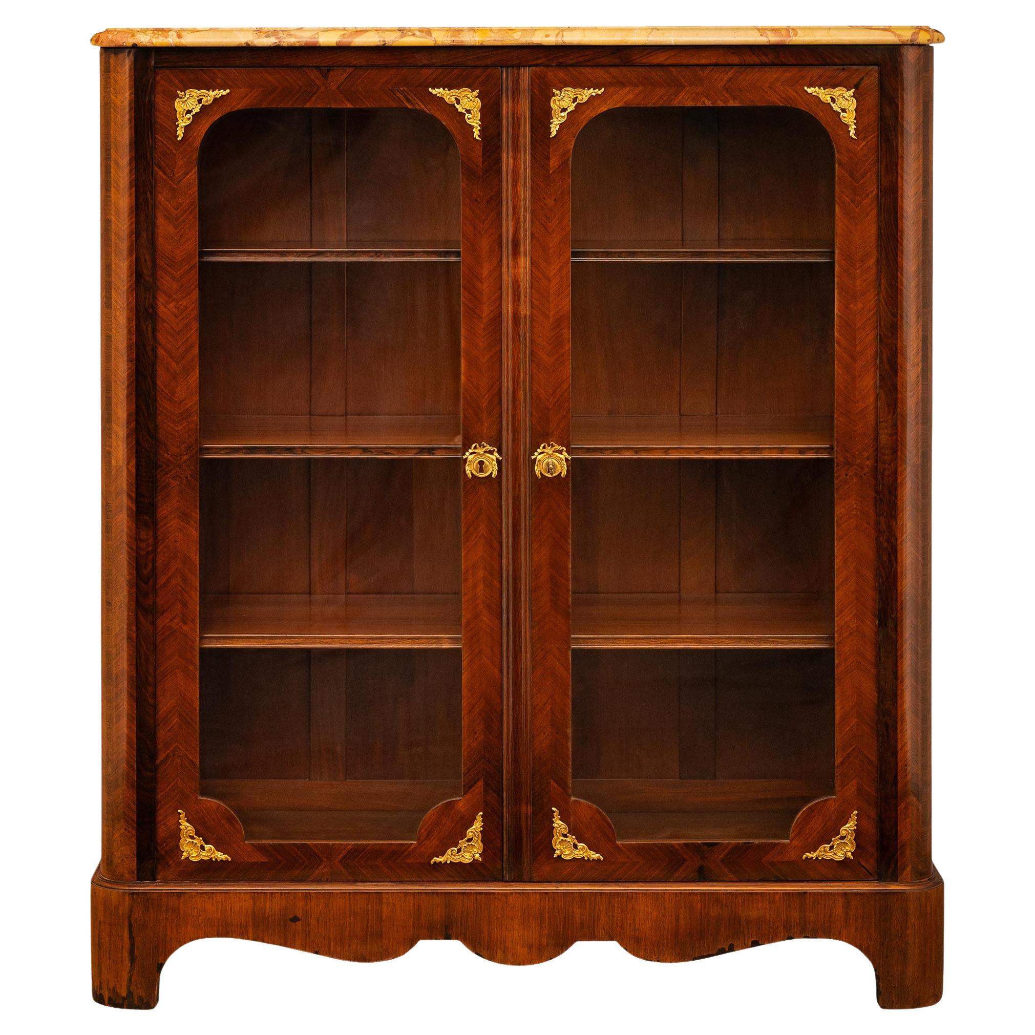 A French late 19th century Louis XIV st. Rosewood and Ormolu vitrine cabinet