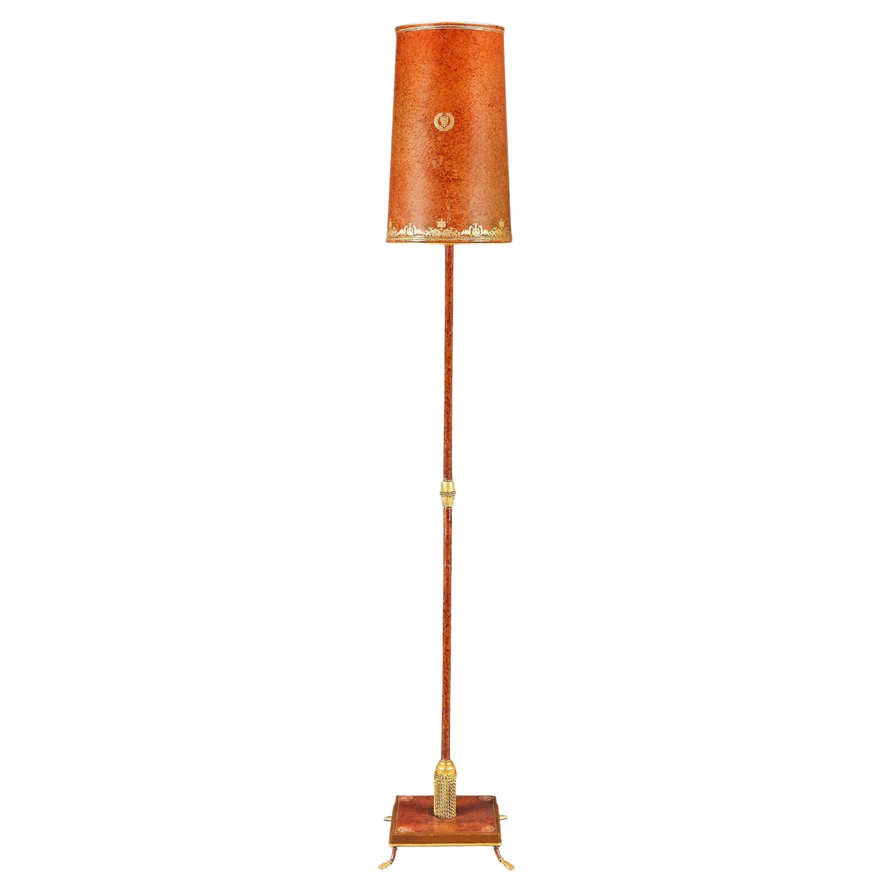 A French Leather Floor Lamps with Gold Tooling For Sale