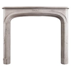 A French Limestone Fireplace in the Louis XIV Style