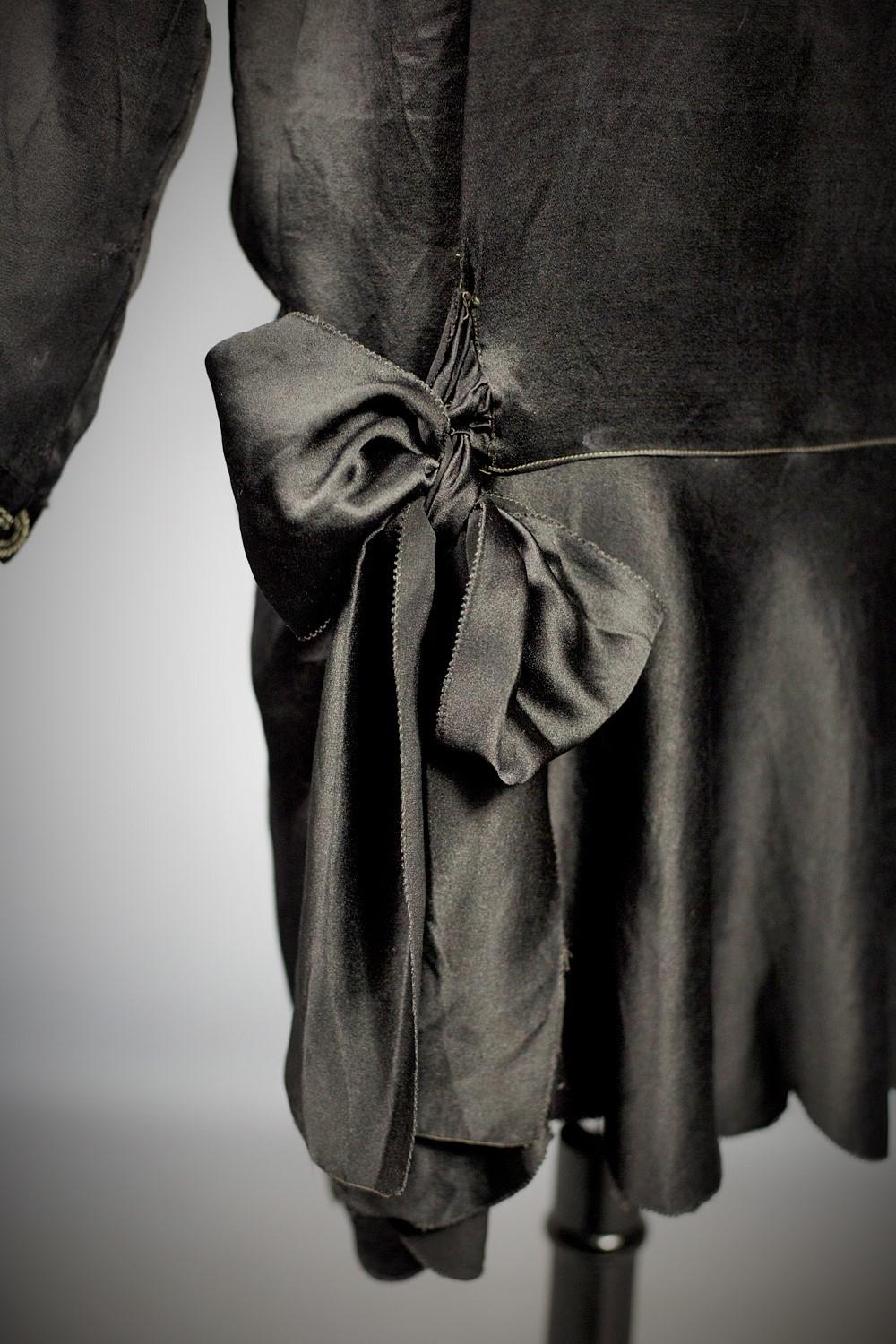 A French Little black Couture Dress in embroidered Duchesse satin Circa 1920 For Sale 5