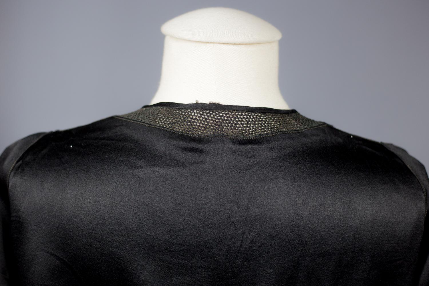 A French Little black Couture Dress in embroidered Duchesse satin Circa 1920 For Sale 9