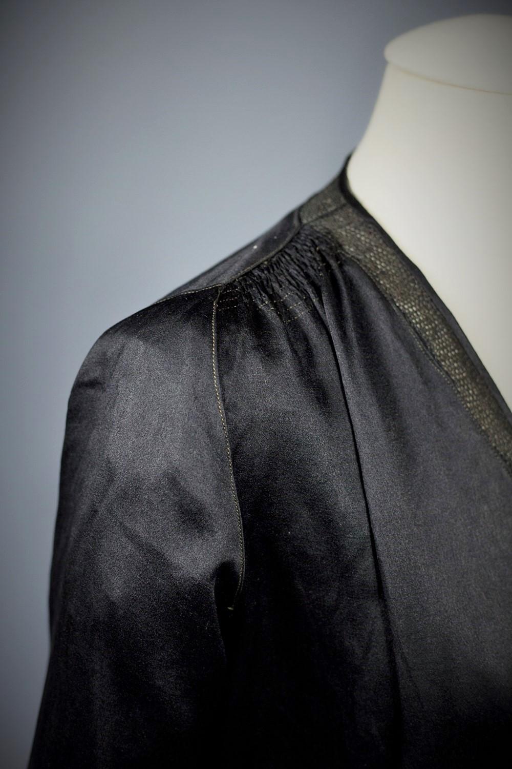 Women's A French Little black Couture Dress in embroidered Duchesse satin Circa 1920 For Sale