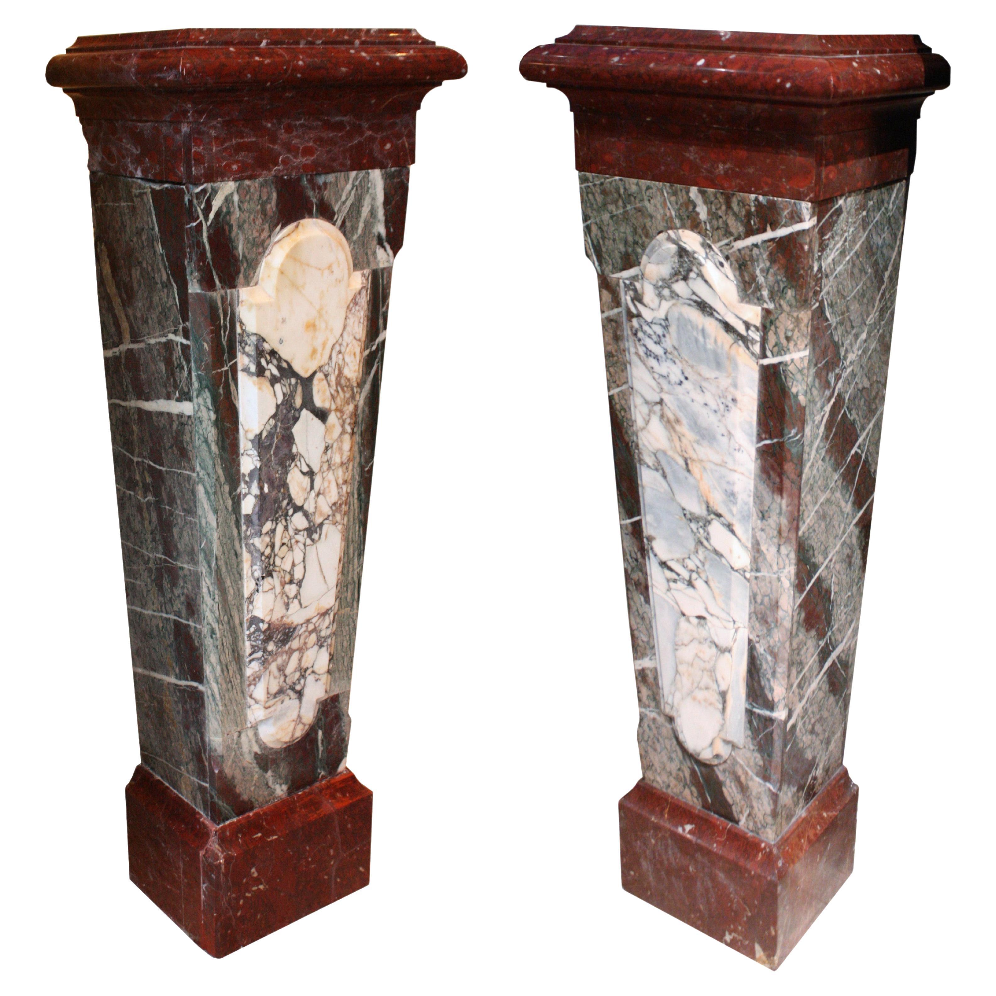 A French Louis XIV style 19th century pair of carved marbles pedestals