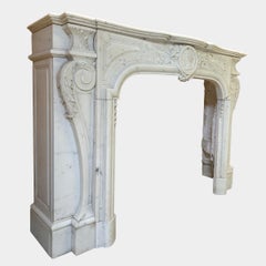 A French Louis XIV Style Antique Statuary White Marble Fireplace Mantel