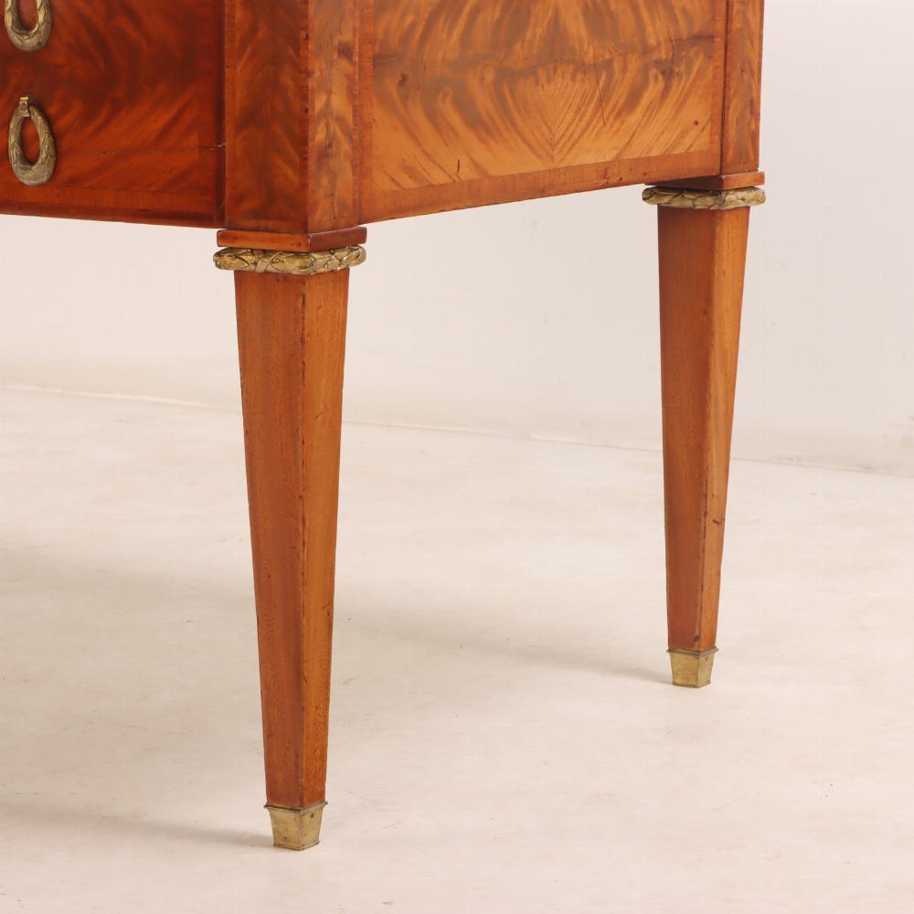 Leather A French Louis XIV style mahogany and crotch mahogany leather top desk, C 1900.