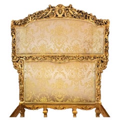 A French Louis XIX/XV Style Giltwood Carved Figural Queen-Size Bed with Cherubs
