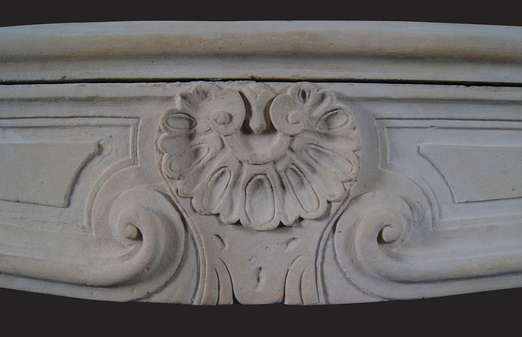 Carved French Louis XV Antique Stone Fireplace For Sale