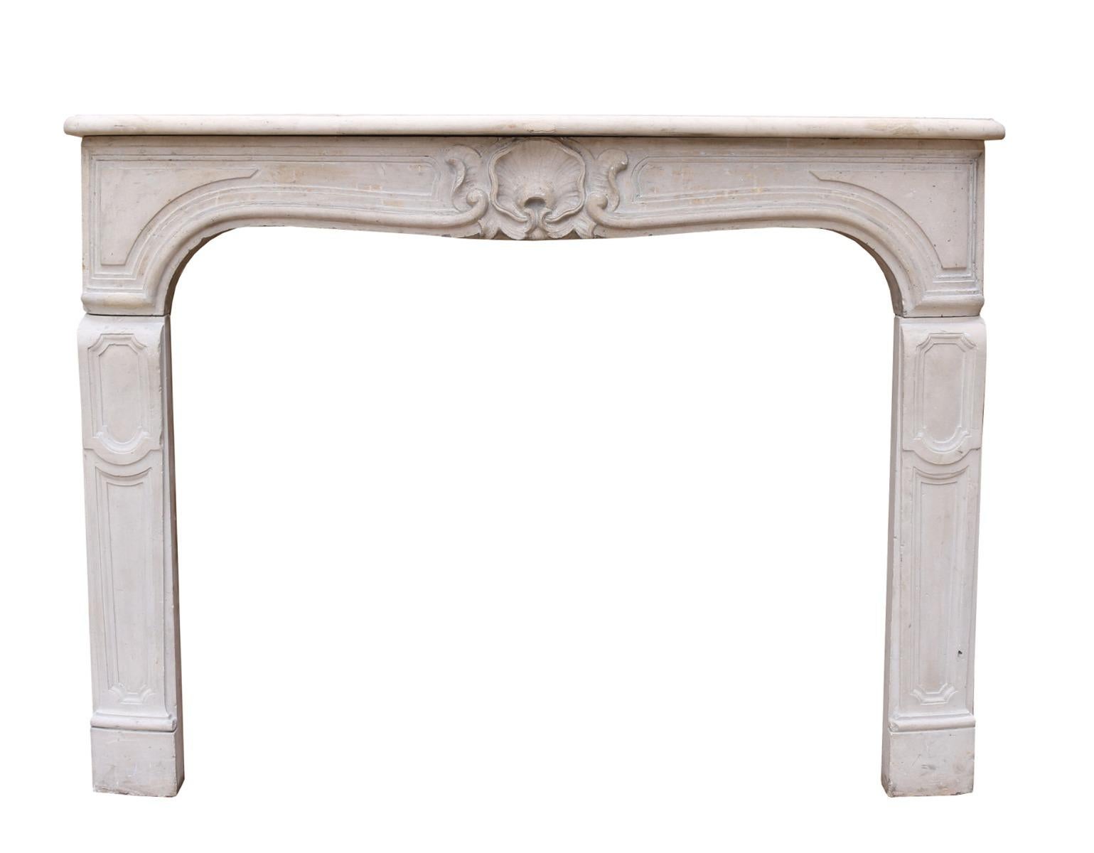 This Limestone fire surround has a serpentine shaped shelf and panel frieze with central shell decoration, scrolled panels and panelled jamb supports.

Additional Dimensions

Opening Height 88.5 cm

Opening Width 113.5 cm

Width between