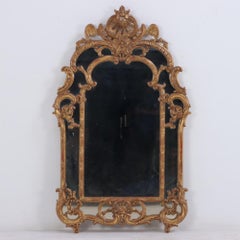 Specchio francese in stile Luigi XV intagliato e dorato C.C. 1940.