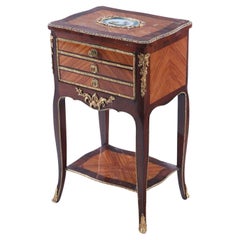 A French Louis XV style kingwood and rosewood cabinet, C. 1900.