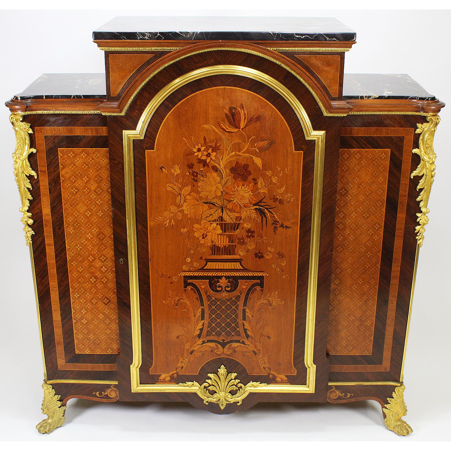 A very fine French Louis XV style Palissandre, Tulipwood, mahogany and Marquetry Meuble D' Appui with one door and veined black marble top, Stamped: M. Descotte & Fils, circa 1880-1890.

Measures: Height 50 1/2 inches (128.3 cm)
Width 48 1/2