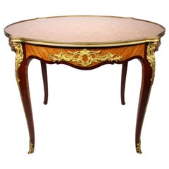 A French Louis XV Style Ormolu Mounted Side or Center Table, Attr. Maison Jansen