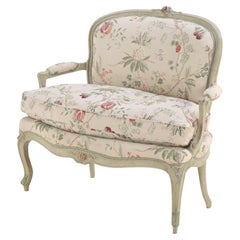 A French Louis XV style painted and upholstered settee, C. 1900.