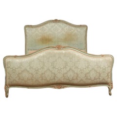 A French Louis XV style painted Full size bed, upholstered circa 1930