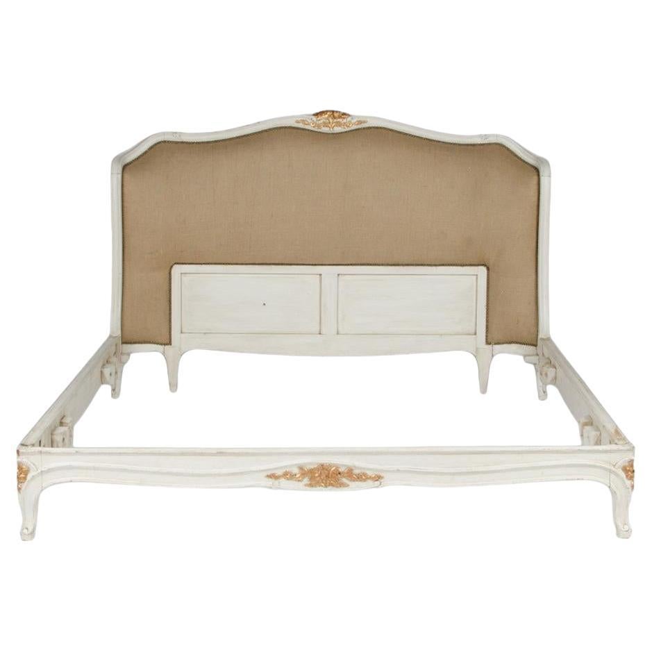 A French Louis XV style Queen size painted and carved burlap bed circa 1940.