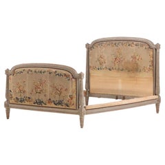 Antique A French Louis XVI style carved and painted, full size bed, 19th C.